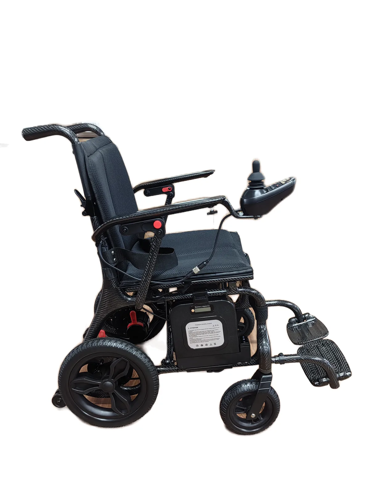 EW1000 carbon fiber electric wheelchair, right side view showing carbon weave frame and battery box